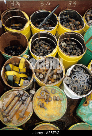 Five gallon buckets filled with bolts used by iron workers on new Random House building at 1540  Broadway in New York City Stock Photo