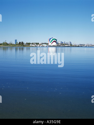 A view from Tenean Beach Quincy Massachusetts. On the shore can be seen the Rainbow gas tank in Dorchester Stock Photo