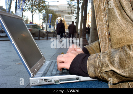 Paris FRANCE, Chinese Man Using WI Fi Internet, Detail, Hands Laptop Computer on Street, people working Stock Photo
