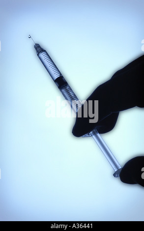 Syringe in Hand Stock Photo