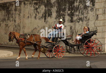 People in a horse carriage Havana Cuba Stock Photo