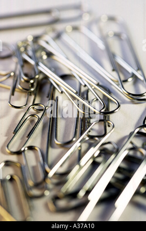 Paper Clips on white coloured background Stock Photo