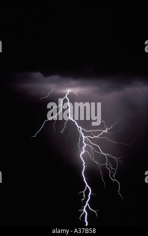 Lightning bolt coming from dark storm cloud Stock Photo