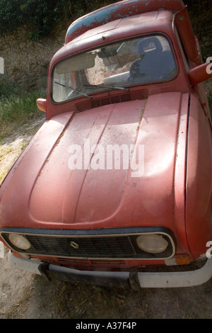 Derelict Abandoned Red Maroon Renault Van Stock Photo