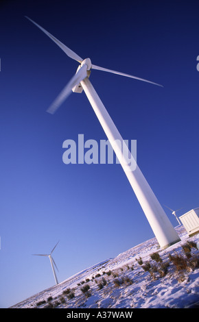 Cold snow winter looking up to wind turbine Hare Hill wind farm East Ayrshire Scotland UK Stock Photo