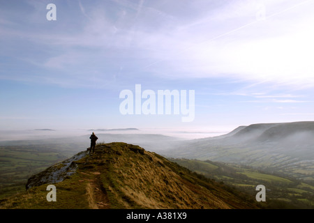 Walking by the cairn on the Cat's Back, Black Mountains, Wales Stock ...