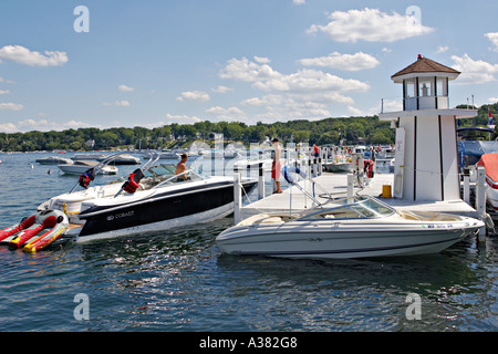 WISCONSIN Fontana Small town marina on Lake Geneva popular vacation destination boating boat pull up to gas pump on dock Stock Photo