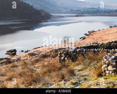 LLYNNAU MYMBYR lakes beyond stone wall in Snowdonia National Park near Capel Curig Conwy Wales UK Britain Stock Photo