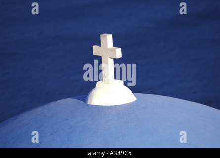 White Cross on Blue Church Dome with Sea in the Background, Greek Islands Stock Photo