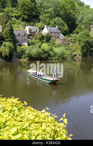 The ancient  hand-pulled cable rope ferry crossing of the River Wye at Symonds Yat, Gloucestershire UK Stock Photo