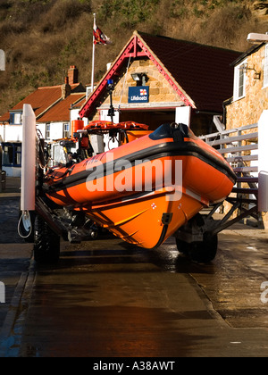 A semi rigid fast rescue craft outside the RNLI lifeboat station at Staithes North Yorkshire Stock Photo