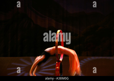 Traditional Chinese acrobats perform for the Acrobatic Circus at The Heaven and Earth Theatre, Beijing, China Stock Photo