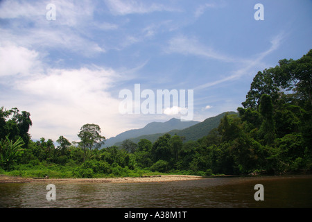 Gunung Api peak on the hozizon, from Sungai Melinau in Gunung Mulu National Park, Sarawak, Borneo, Malaysia Stock Photo