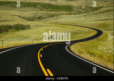 Highway curves with orange center striping, Utah Stock Photo