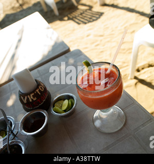 A refreshing fruit cocktail on a beach table Stoen Island Mazatlan Mexico Sinaloa Stock Photo