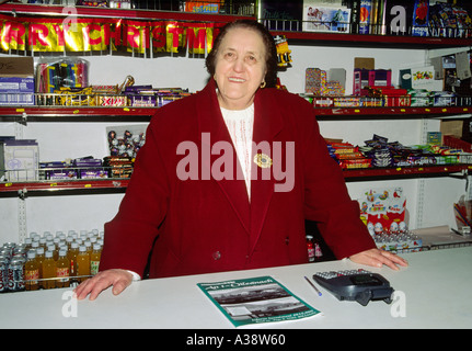 Rathlin Island. The shopkeeper in the islands general store. Off the north coast of County Antrim, Northern Ireland. Stock Photo