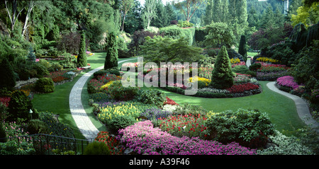 Vancouver Butchart Sunken Gardens Red Green Yellow Flowers Green Trees Purple Plants Stock Photo
