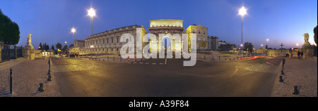 Montpellier arche de Triomphe France Old City Street Cobbled Stone Dusk Sky Sunset Afterglow Stock Photo