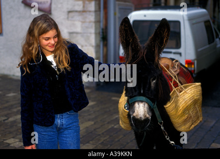 1, one, French girl, French teen girl, French teenage girl, teen, teenage girl, teenager, donkey, Christmas season, Valbonne, France, Europe Stock Photo