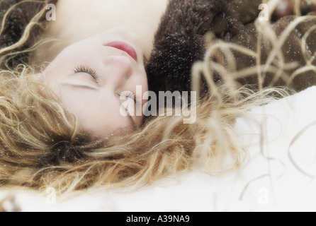 sleeping beauty in the snow Stock Photo