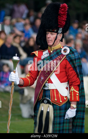 Drum major Norman Balfour leads Ballater and District pipe band into the arena Stock Photo