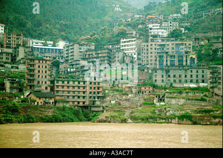 Old apartment houses on the  bank of the Yangtze River expansion project, Three Gorges Dam,  Yangtze River, China