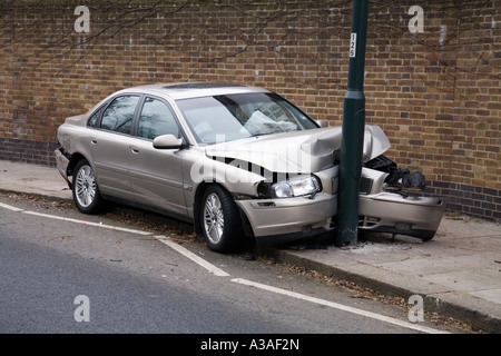 Car Volvo S80 D5 which has crashed into a lamp post UK Stock Photo