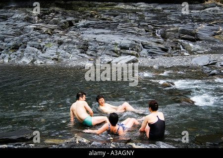 people enjoying natural hot river water of Tona hotspring bath resort valley scenery Maolin Kaoshiung County Taiwan China Stock Photo