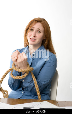 Desperate office worker with bound hands Stock Photo