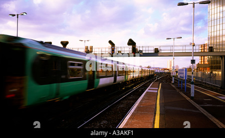 Commuter train passing through East Croydon station in south London England UK Stock Photo