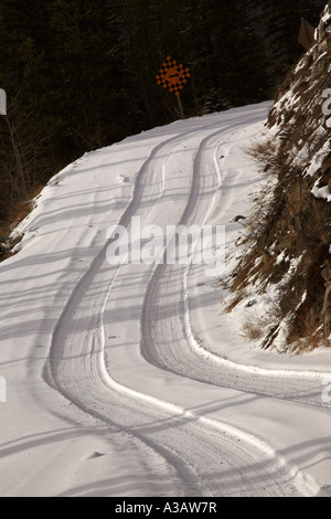 narrow Alberta logging road in winter Stock Photo