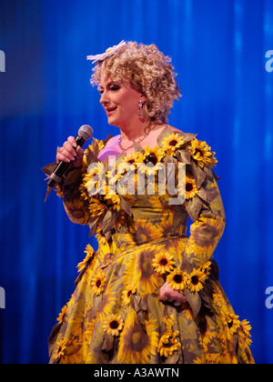 Dutch performer singer diva Karin Bloemen live on stage wearing one of her trademark flower dresses Aalsmeer the Netherlands Stock Photo