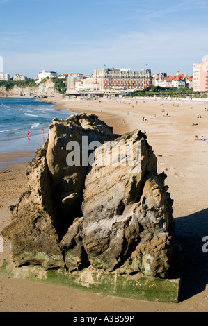 FRANCE Aquitaine Pyrenees Atlantique Biarritz Basque Atlantic coast seaside resort. Grande Plage and Hotel du Palais with rock Stock Photo