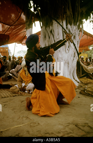 Nihang practicing Archery Saboki Talwandi Punjab near Bhatinda India Stock Photo