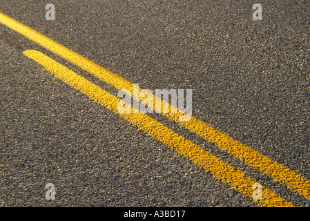 Highway with yellow striping to indicate no passing or crossing into ...