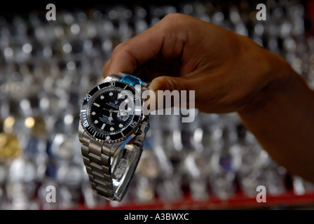 Man selling fake designer brand watches street market Ubud, Island of Bali in Indonesia Southeast Asia  2006 2000s HOMER SYKES Stock Photo