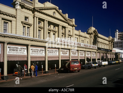 Shops and bank in street with parking meters Bulawayo Zimbabwe Stock Photo