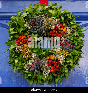 Christmas wreath on blue door Stock Photo