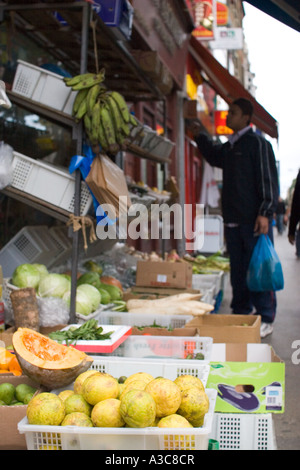 The busy, vibrant and colourful Whitechapel market in Tower Hamlets East London, UK Stock Photo