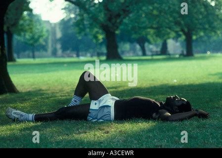 man relaxing on the grass Stock Photo