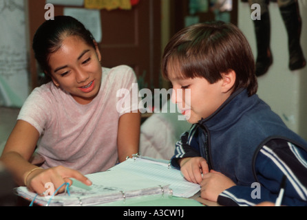 Junior high school students work together in a social studies class Stock Photo