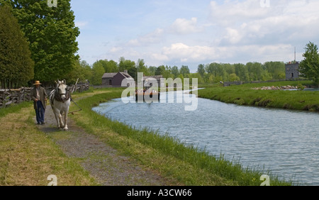 Canada Ontario Upper Canada Village living history museum circa 1860s horse towing scow along canal Stock Photo