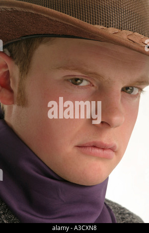 Male teenager wearing a Stetson hat Stock Photo