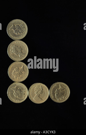 BRITISH POUND COIN FONT LETTER L ON BLACK Stock Photo