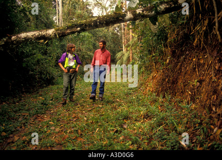 Brazilian man, Brazilian woman, couple, naturalist, hikers, hiking trail, Atlantic Rainforest, Itatiaia National Park, Rio de Janeiro State, Brazil Stock Photo