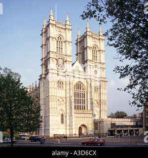 Historical Westminster Abbey iconic Portland stone west front facade & towers of famous Anglican abbey church religious building London England UK Stock Photo