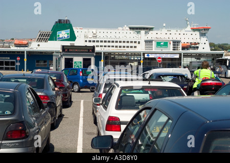 Cars Waiting to Board Irish Ferries Vessel Isle of Inishmore Pembroke Dock Ferry Terminal Pembrokeshire West Wales Stock Photo