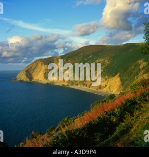 Countisbury Hill & Foreland Point with Sillery Sands at foot of steep cliffs and South Wales on horizon Lynmouth Devon England Stock Photo