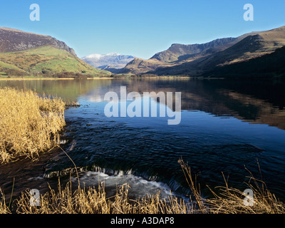 SNOWDON Yr Wyddfa from west across lake Llyn Nantlle Uchaf in winter. Snowdonia National Park Nantlle Gwynedd North Wales UK Stock Photo
