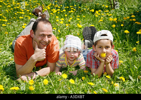 Father Gaudenz Huggel with his two sons Stock Photo